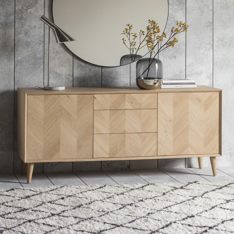 Warm wooden sideboard with chevron design