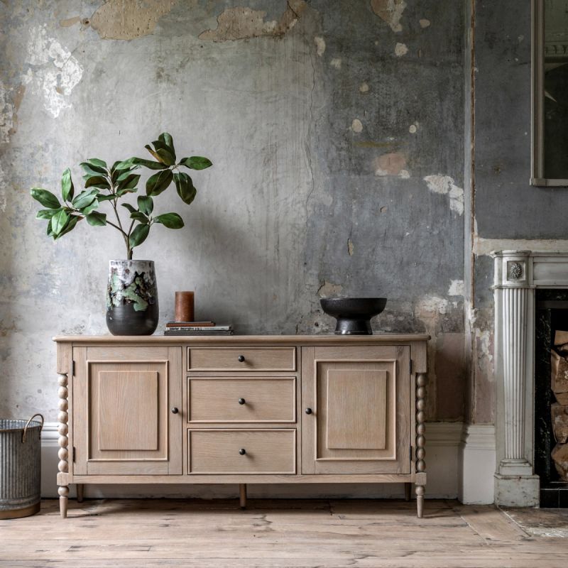 Lime wash wooden sideboard with bobble effect legs