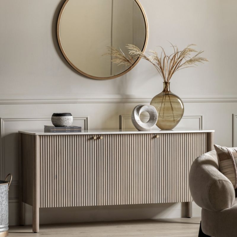 Console with striking vertical ribbed feature on the drawers and polished white marble top