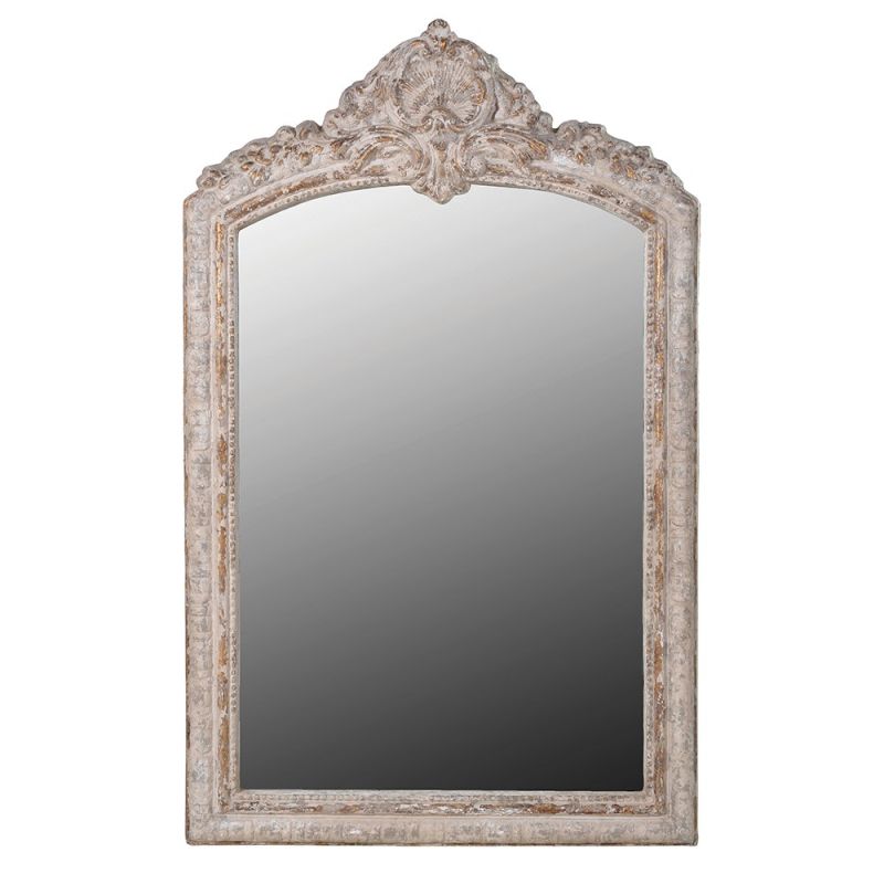 A distressed mirror adorned with an arch top and speckled glass