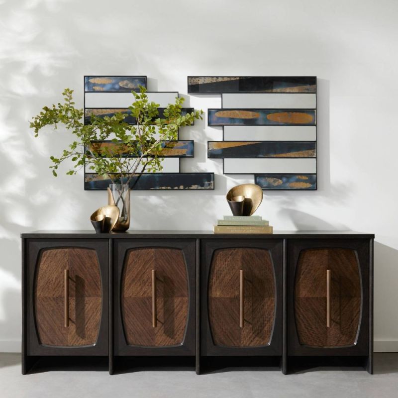 Dark wood sideboard with four panelled doors and brass handles