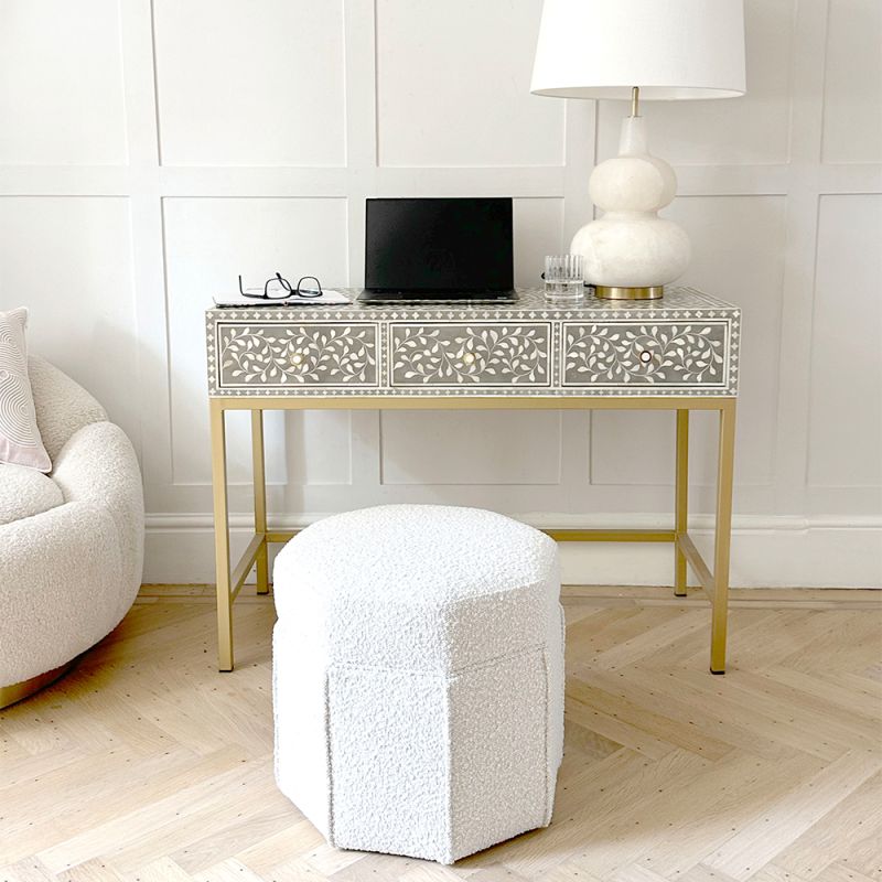 Striking dressing table with three drawers and brass base