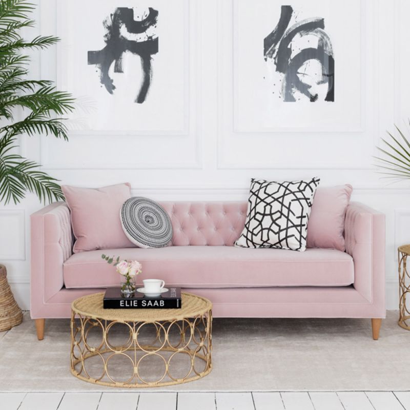 Luxurious deep buttoned pink velvet sofa