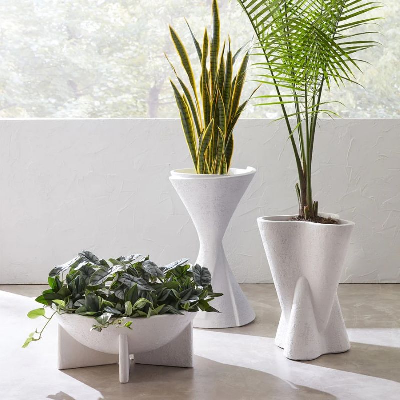 Elevate your space with the Hans Low Planter. Its modern design and durable material make it perfect for indoor and outdoor plants. Style meets functionality!