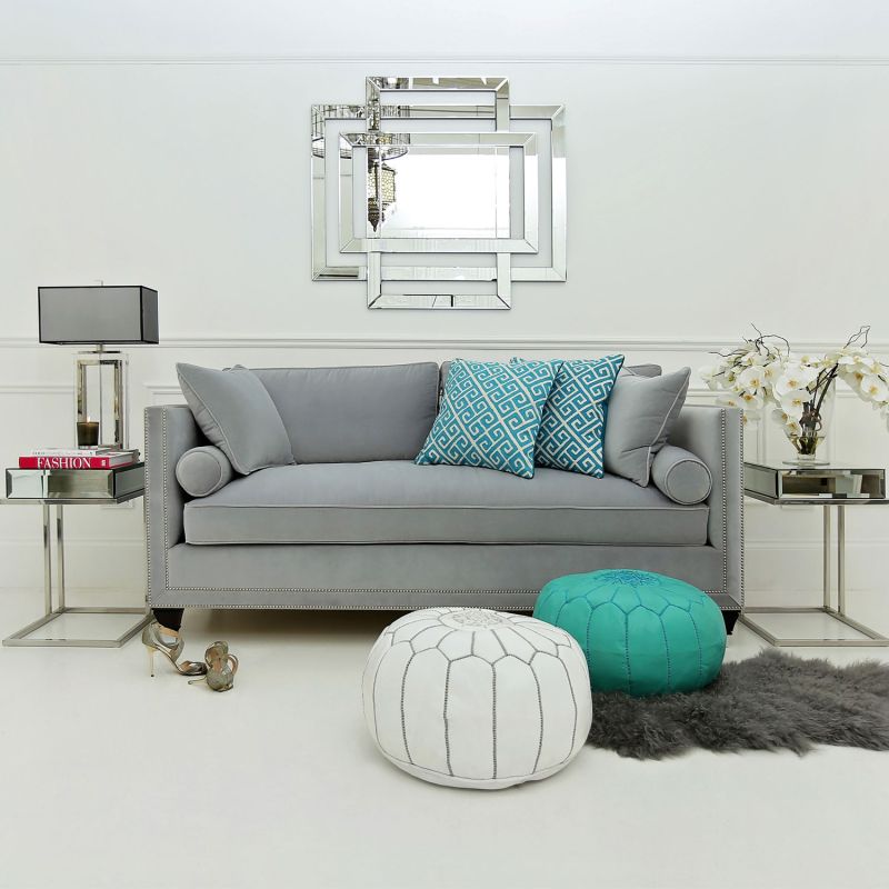 Luxury designer velvet sofa with silver stud detailing