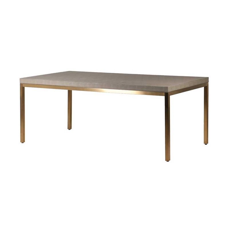 Glamorous dining table with shagreen textured surface and gold legs