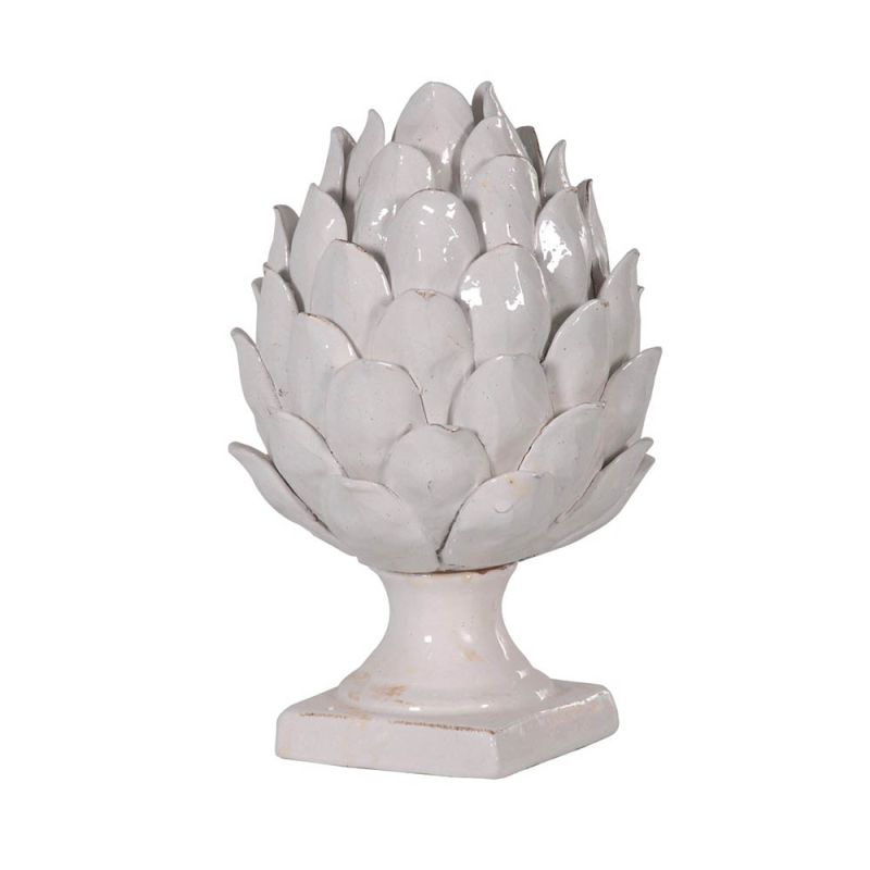 a lovely rustic artichoke shaped decorative object on a pedestal