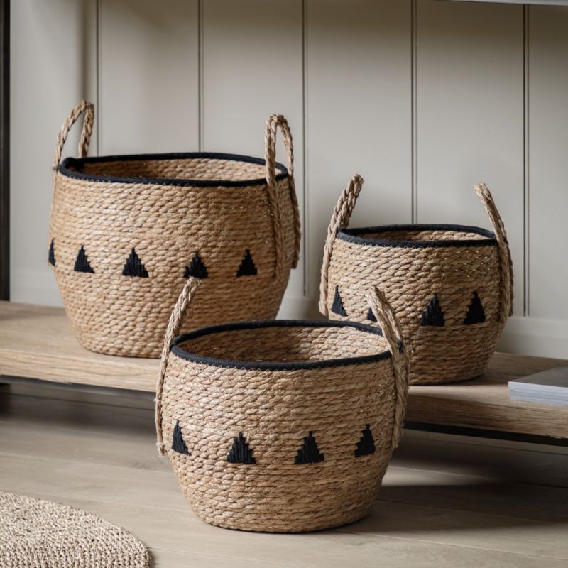 Set of three woven baskets with black detailing