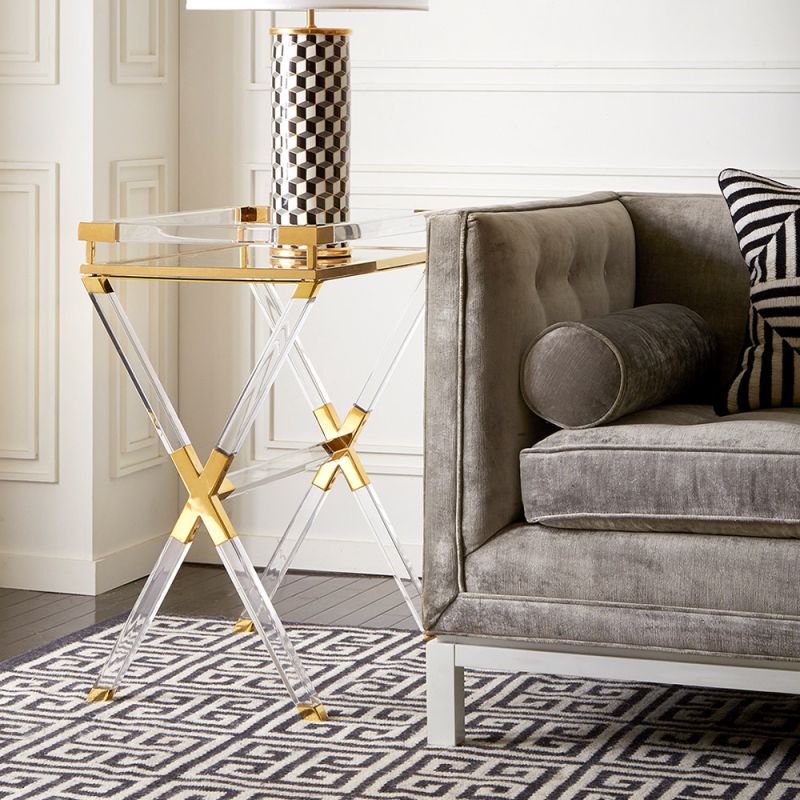 A luxurious acrylic and brass tray table by Jonathan Adler