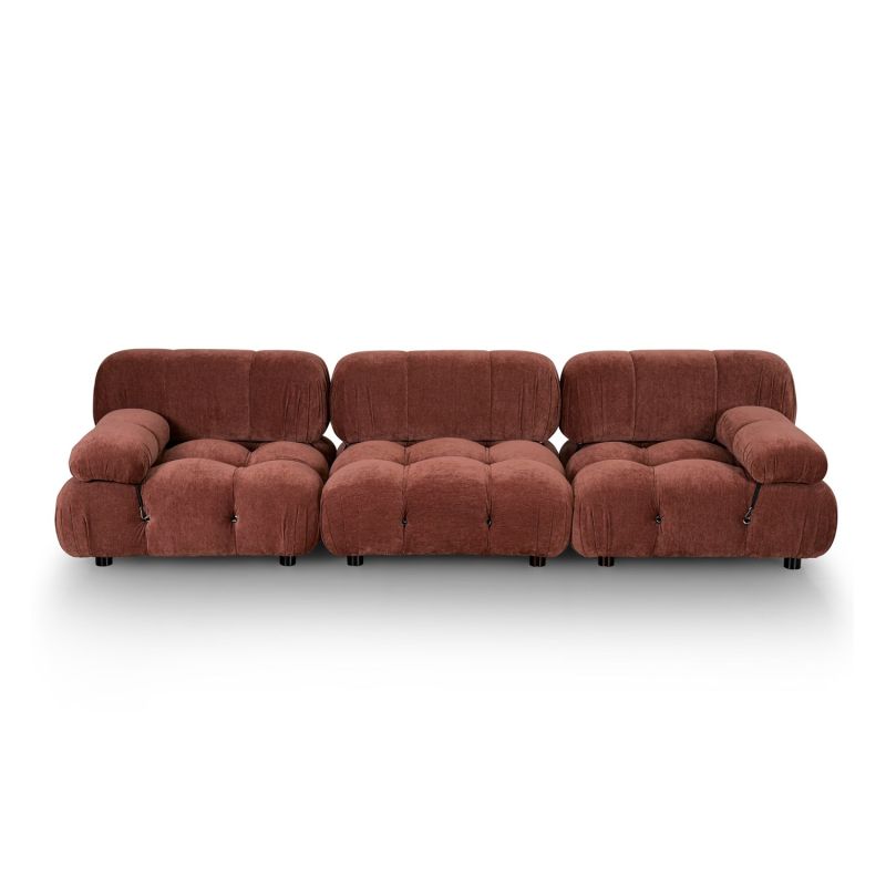 A statement modular sofa with a stylish rust upholstery and deep buttoned design