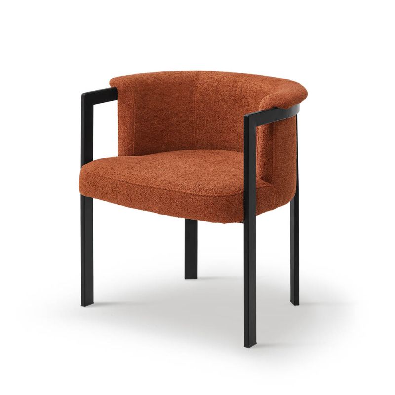 Gorgeous boucle upholstered dining chair in rust with black frame