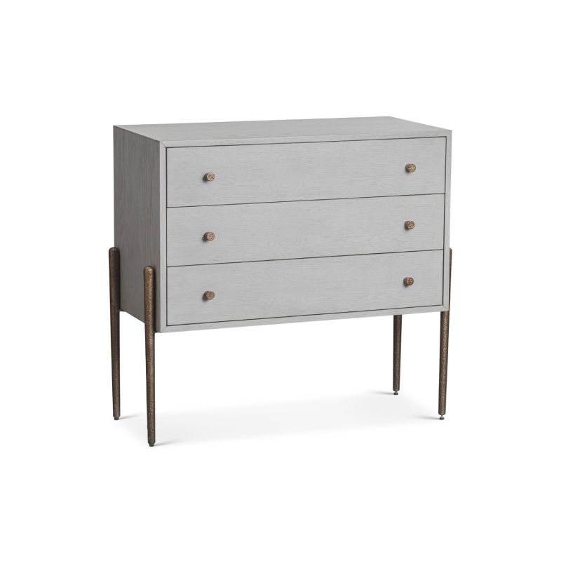 A luxury chest of drawers with grey and bronze finish