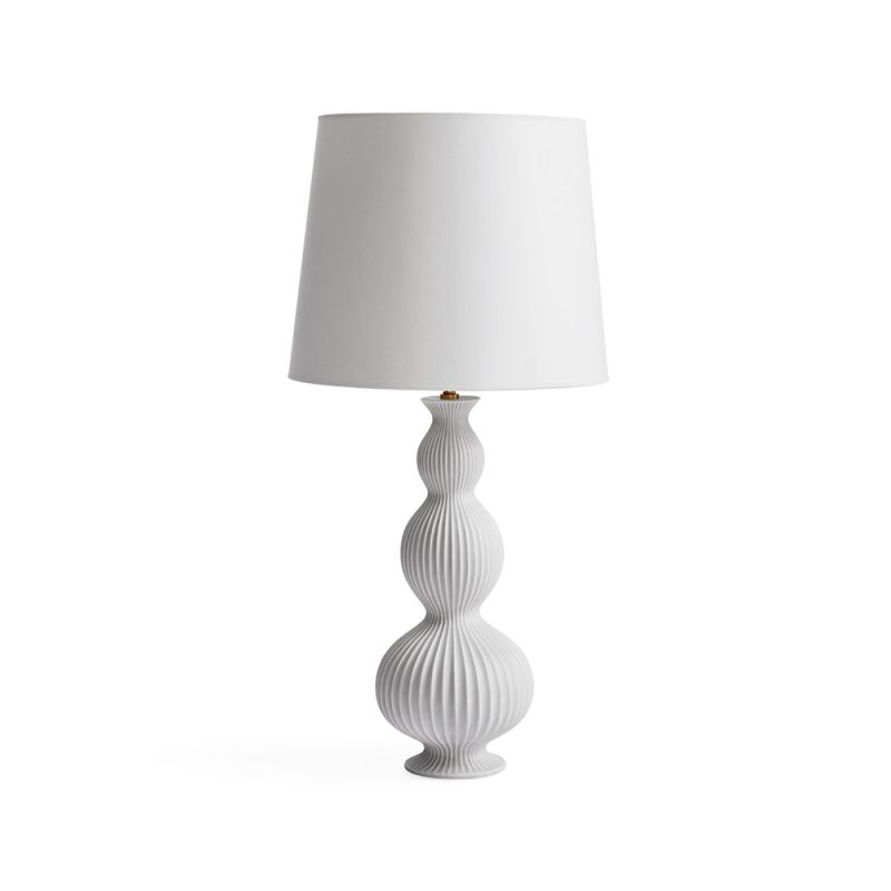 A chic table lamp by Jonathan Adler featuring a sinuous silhouette, stoneware structure, subtle lines, a matte glaze and white paper lampshade