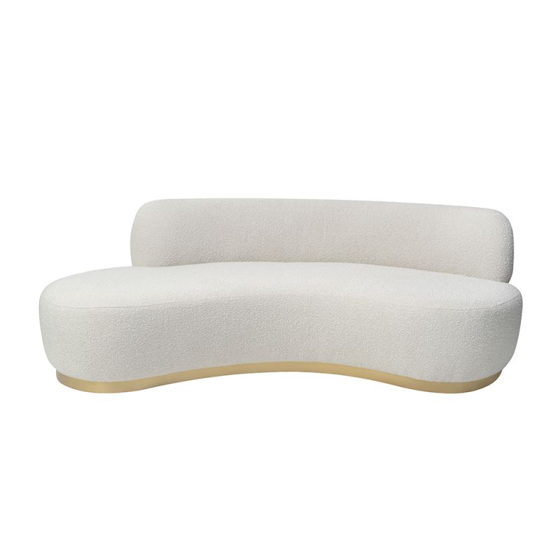 A contemporary curved sofa by Liang & Eimil with a boucle upholstery and brushed brass base