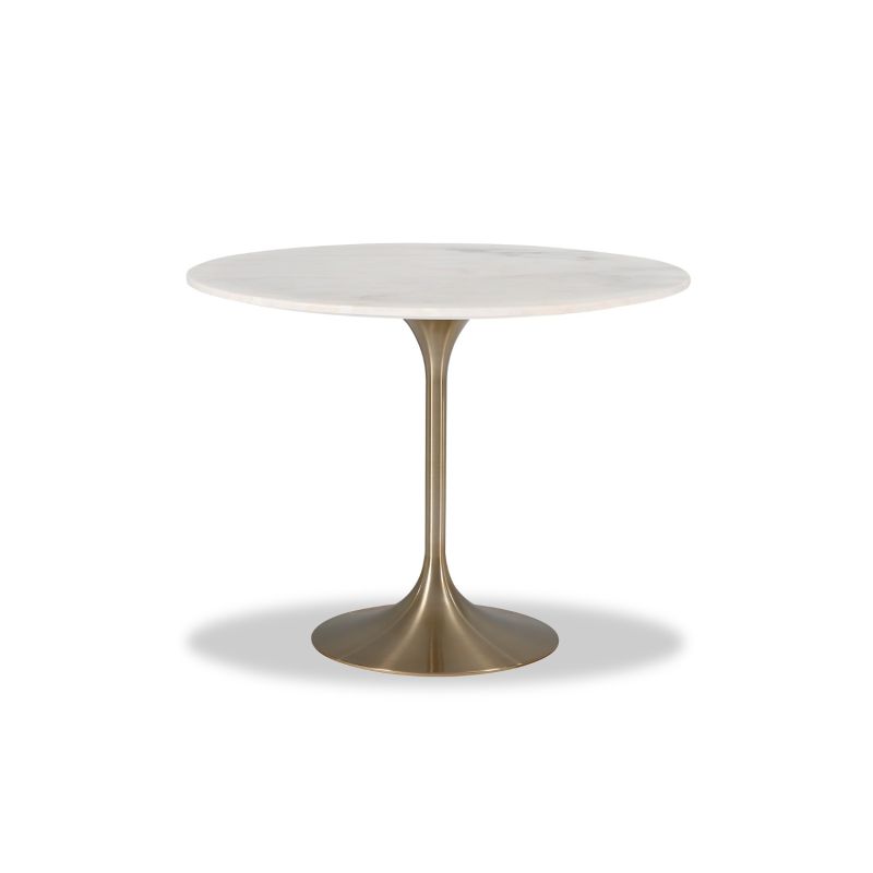 White marble dining table sitting atop brass base