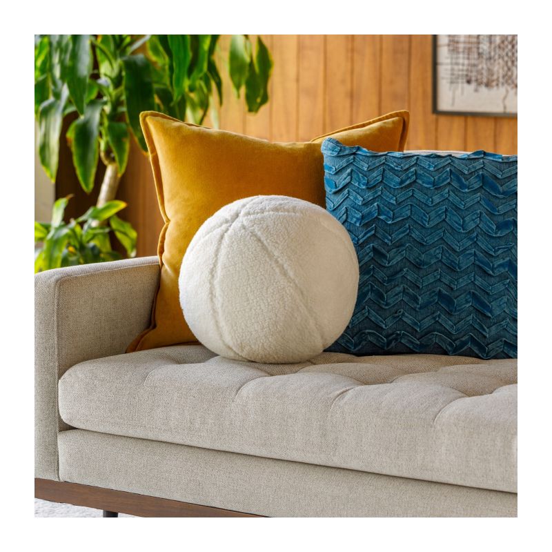 Cosy up with our Bola Fleece Cushion! The ultra-soft design offers comfort and style for your living space. Perfect for snuggling or decorating!