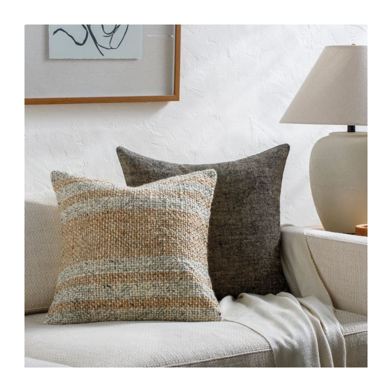 Elevate your space with the Lesley Woven Cushion, featuring intricate patterns and soft textures that add comfort and style to any room.