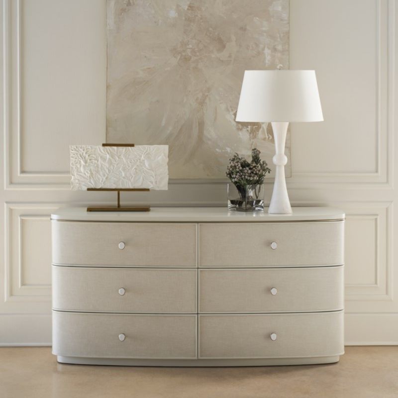 Discover the Lyon Dresser by Caracole, a stylish blend of elegance and functionality. Perfect for adding sophistication to any bedroom decor.
