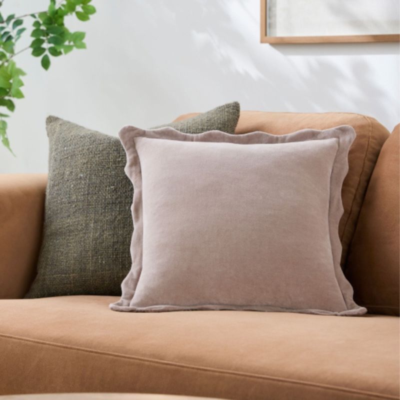 Discover comfort and style with our Effervescent Woven Cushion in mauve. Perfect for adding a pop of colour and cosiness to any space!