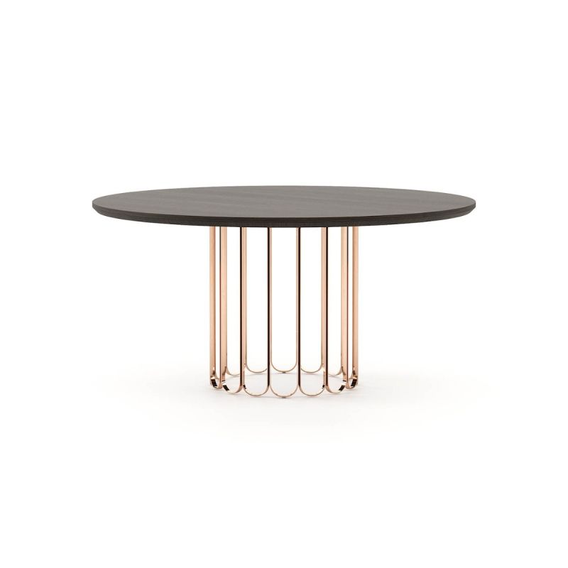 A luxurious oak table with an art deco-inspired copper base 