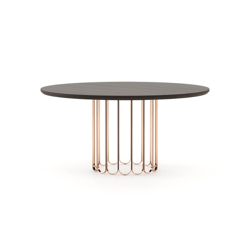 A luxurious oak table with an art deco-inspired copper base 