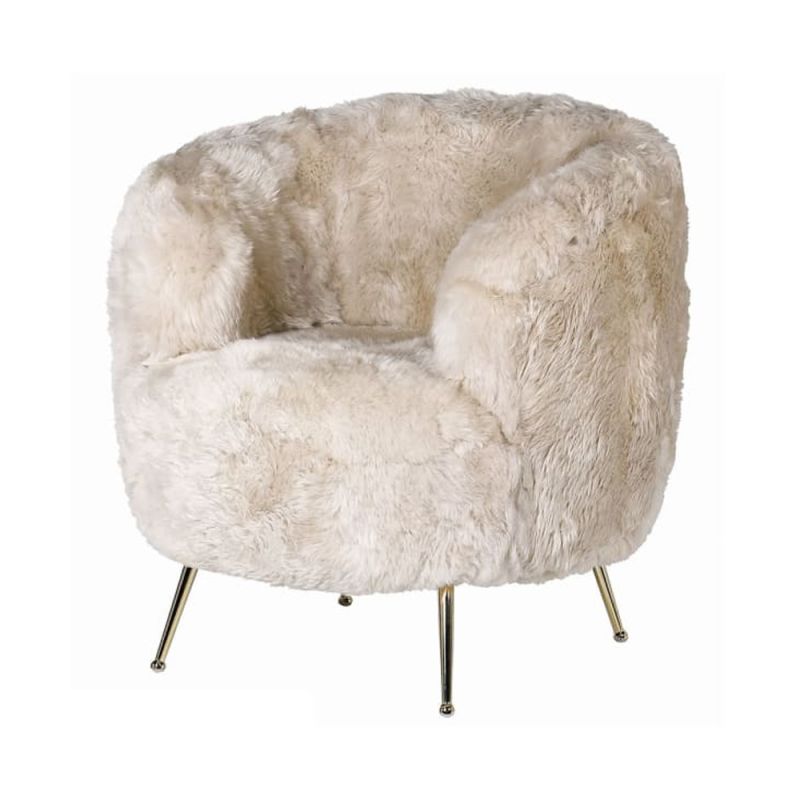 a luxurious cream-coloured fur armchair with golden tapered legs