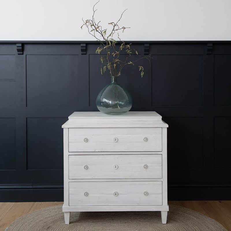 Charming three drawer chest in clean and elegant white washed finish