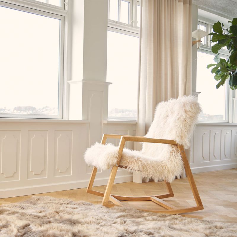 Gorgeous Scandinavian inspired rocking chair with cosy sheepskin seat and backrest