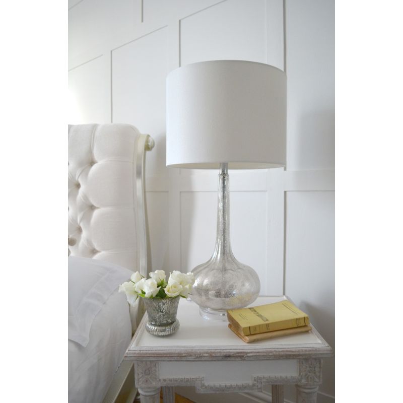 Shimmering glass base table lamp with white shade