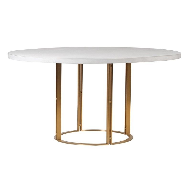Circular white concrete dining table