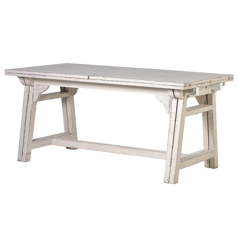 large extendable dining table with a whitewash finish
