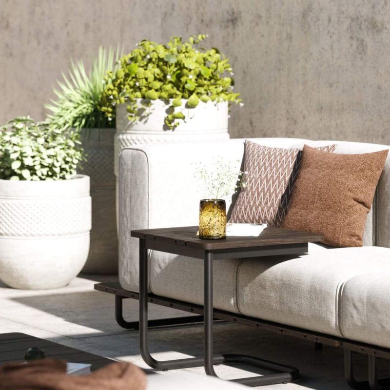 A luxurious brown laminate and painted steel side table 