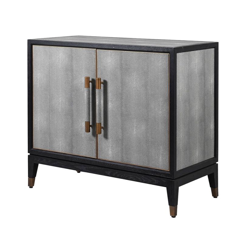 A luxurious small grey faux shagreen cabinet with black and brass accents