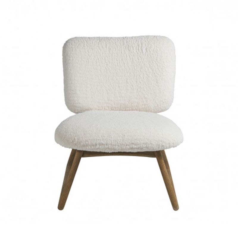 A luxurious faux shearling armchair with natural oak frame