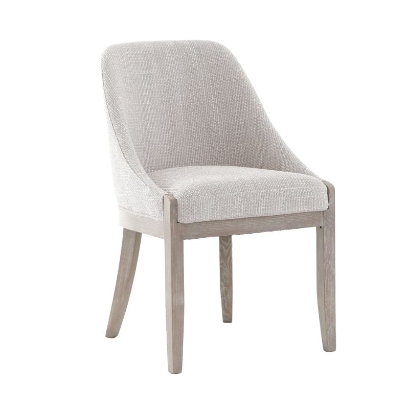 The Burford Dining Chair, with its generous seat, curved back, and solid oak frame in American washed new grey, brings modern sophistication and luxury to everyday dining.