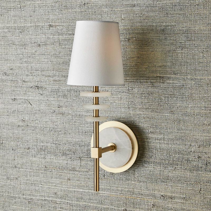 Elegant wall light with alabaster rings and brass fix