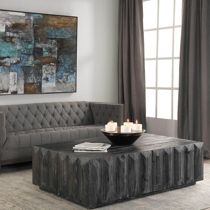 Bold black wooden coffee table with bevelled panel sides