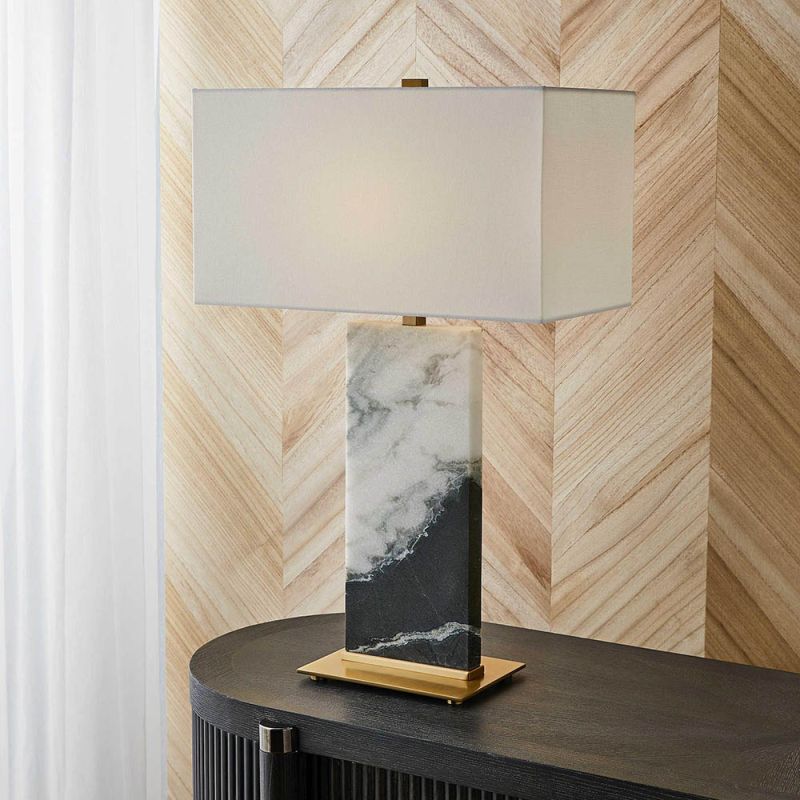 Black and white marble lamp with brass base and rectangular linen shade