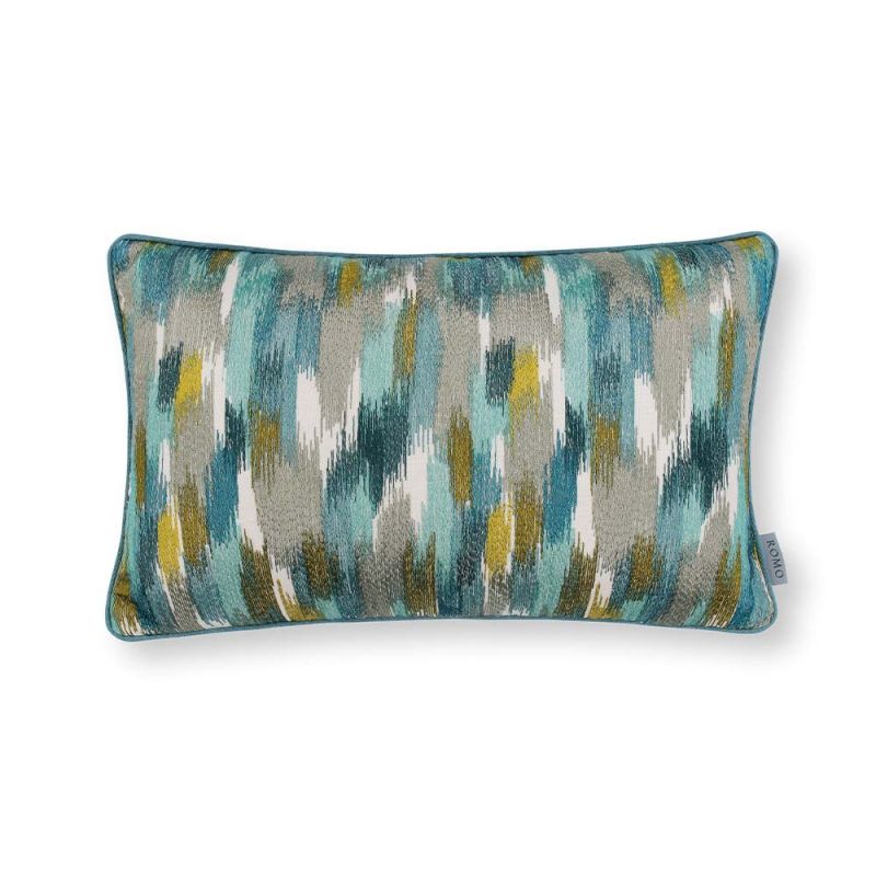 An embroidered linen cushion with tropical inspired coloured