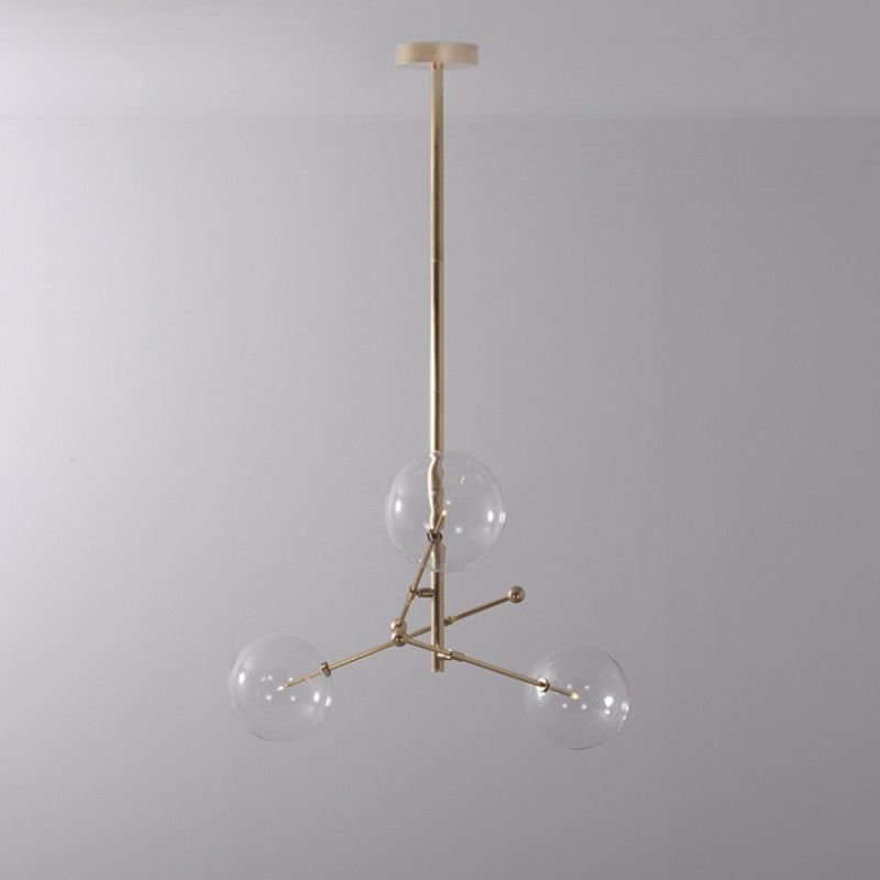 Natural brushed brass industrial style 3 arm chandelier with clear glass globe bulbs