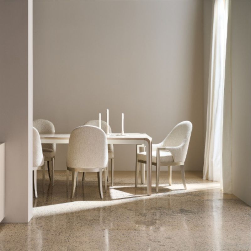 Discover the elegant Romus Extending Dining Table by Caracole. Perfect for any occasion, its light finish adds sophistication to your dining space.