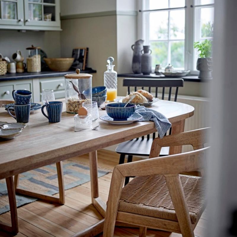 Elevate your dining experience with the Serrone Dining Table, featuring a sleek design and premium materials for stylish gatherings and lasting memories.