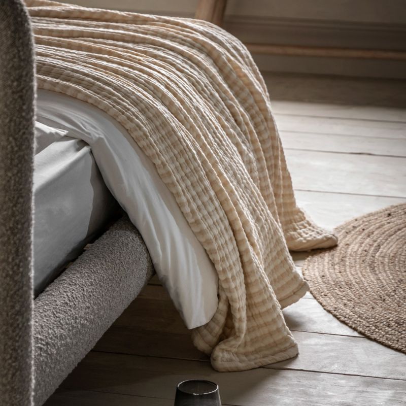 Beige crinkle stripe bedspread