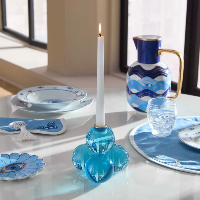 Illuminate your space with the elegant Globo Candle Holder. Crafted from quality materials, it adds a touch of sophistication to any decor.