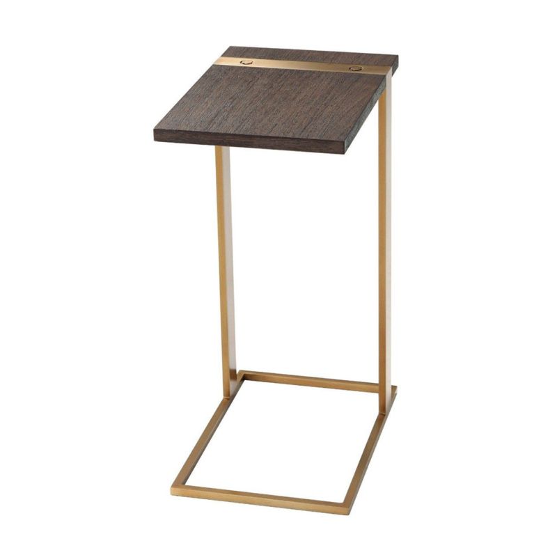 A luxury end table with a brushed brass base and walnut coloured table top