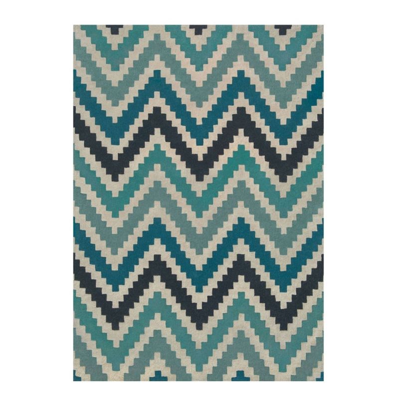 Hand-tufted wool rug with chevron pattern in teal