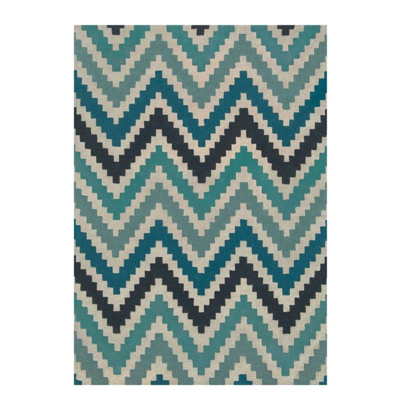 Hand-tufted wool rug with chevron pattern in teal