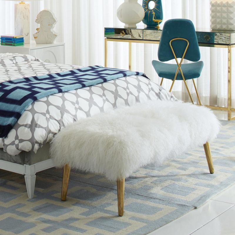 A lavish, white Mongolian bench with polished brass legs
