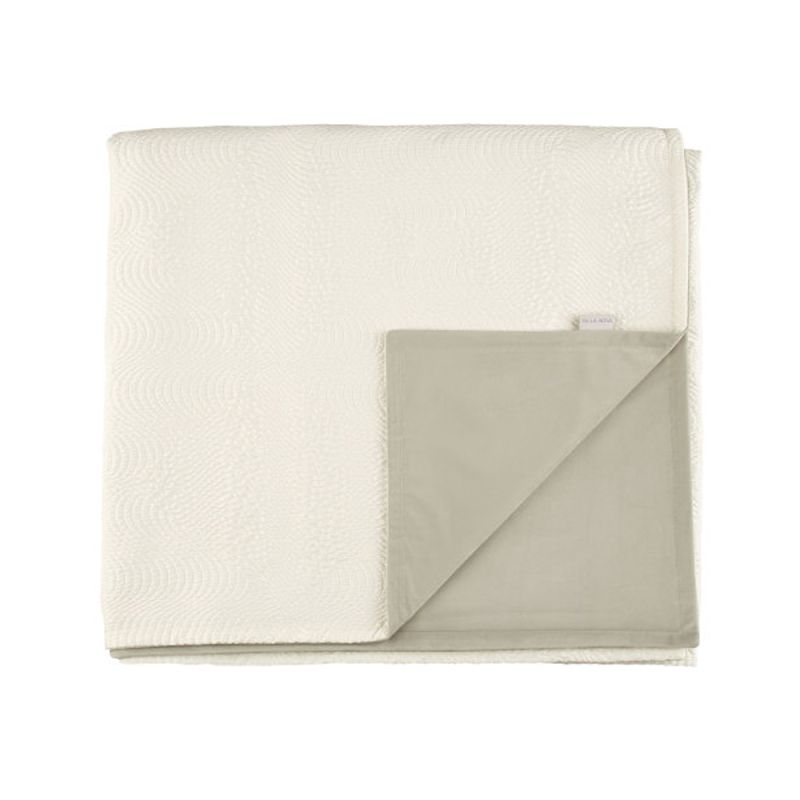 Quilted chalk white throw with soft velvet interior