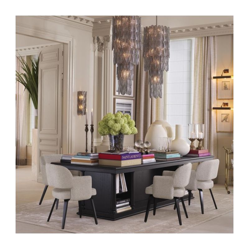 Upholstered dining chair with classic silhouette and black wooden legs